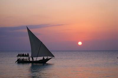 Zanzibar dhow sailing at sunset